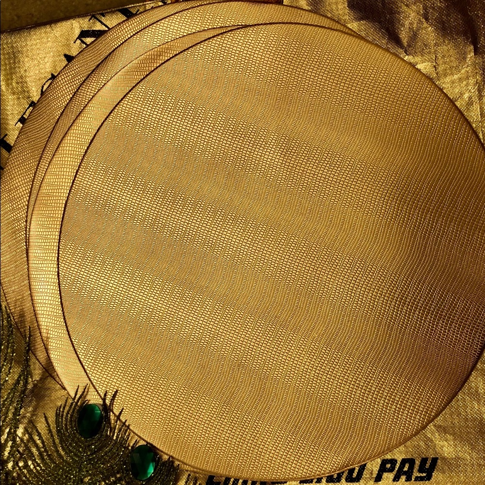 Gold color vinyl dining placemats (4)
